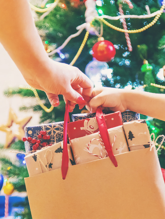 Christmas shopping gifts. Gifts in the package. Selective focus. holidaysの写真素材