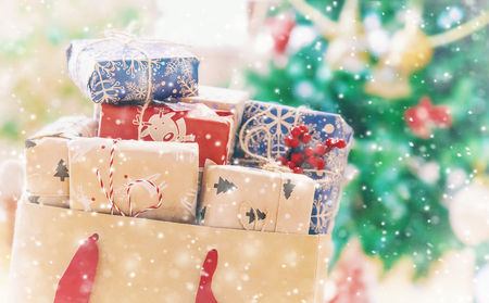 Christmas shopping gifts. Gifts in the package. Selective focus. holidaysの写真素材