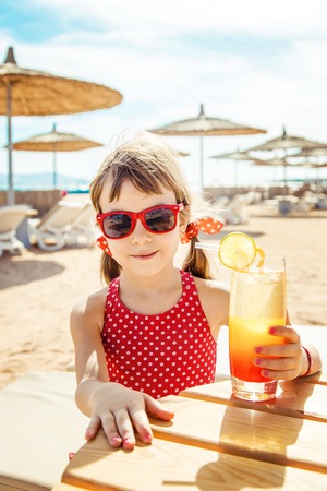 girl child resting on the sea. Selective focus. nature.の写真素材