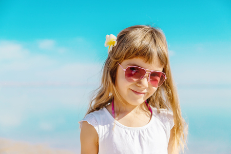 Child on the beach. Sea shore. Selective focus. natureの写真素材