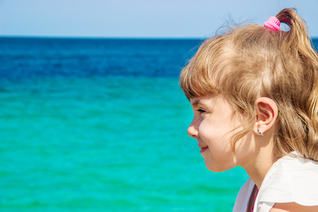 Child in the water. Selective focus.の写真素材