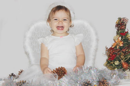 little child in the costume of an angel. Selective focus.の写真素材