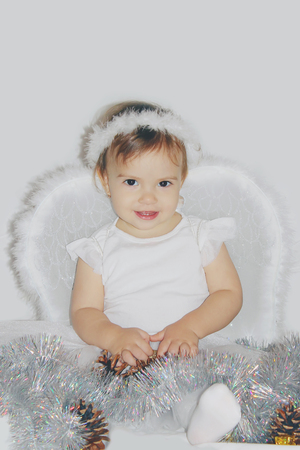little child in the costume of an angel. Selective focus.の写真素材