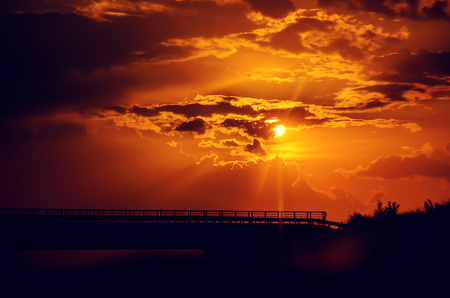 clouds in the sky and the rays of the sun. sunset, selective focus.の写真素材