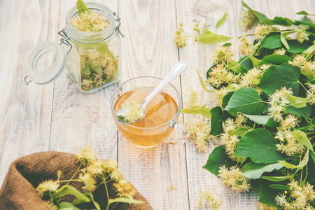 linden tea and flowers. Selective focus. drink cupの写真素材