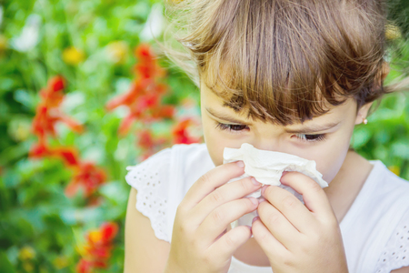 Seasonal allergy in a child. Coryza. Selective focus. natureの写真素材