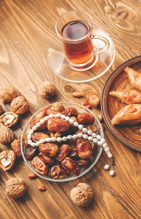 Dates, rosaries and baklava. Ramadan Selective focus natureの写真素材