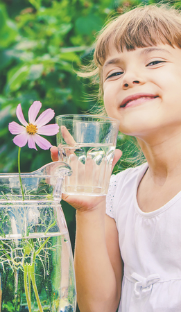 child glass of water. selective focus. food and drink. natureの写真素材
