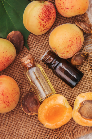 apricot oil in a small jar. selective focus. nature.の写真素材