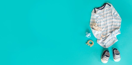 baby accessories for newborns on a colored background. selective focus. nature.の写真素材
