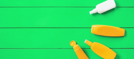 Sunscreen on a blue background. Selective focus. natureの写真素材