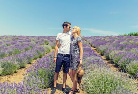 Lovers in the blooming field of lavender. Selective focus. nature.の写真素材