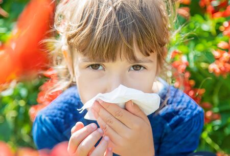 Seasonal allergy in a child. Coryza. Selective focus.の写真素材