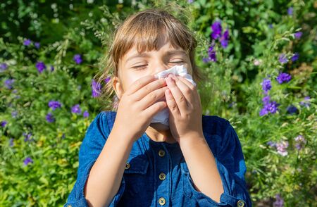 Seasonal allergy in a child. Coryza. Selective focus.の写真素材
