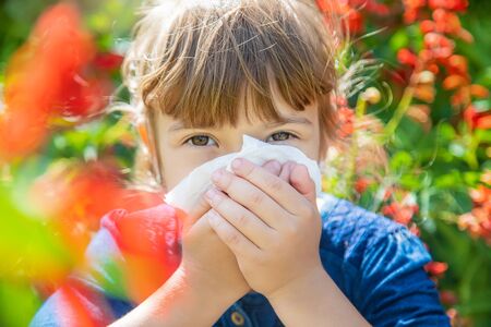 Seasonal allergy in a child. Coryza. Selective focus.の写真素材