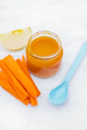 Baby food. Mashed vegetables and fruits in jars. Selective focus. nature.の写真素材