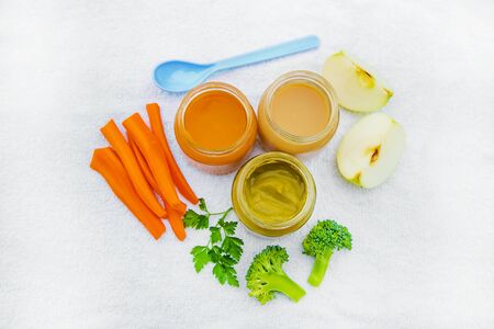 Baby food. Mashed vegetables and fruits in jars. Selective focus. nature.の写真素材