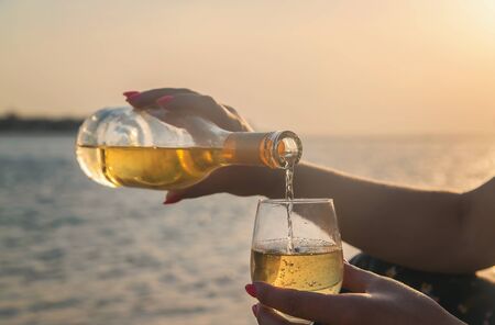 Drink wine by the sea. Selective focus. natureの写真素材