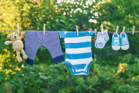 washing baby clothes. Linen dries in the fresh air. Selective focus. nature.