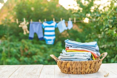 washing baby clothes. Linen dries in the fresh air. Selective focus. nature.の写真素材