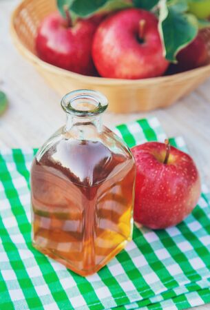 Apple cider vinegar in a bottle. Selective focus. nature.の写真素材