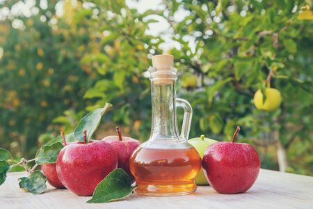 Apple cider vinegar in a bottle. Selective focus. nature.の写真素材