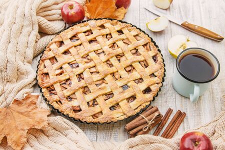 Pie with apples and cinnamon. Selective focus. Food.の写真素材