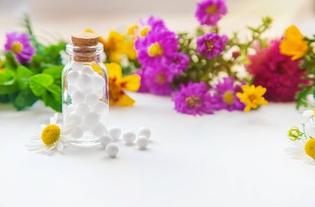Homeopathy. Herbal extracts in small bottles. Selective focus. nature.の写真素材
