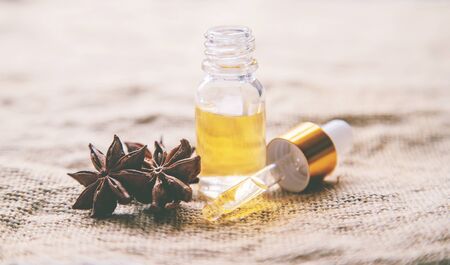 Star anise oil in a small bottle. Selective focus. nature.の写真素材