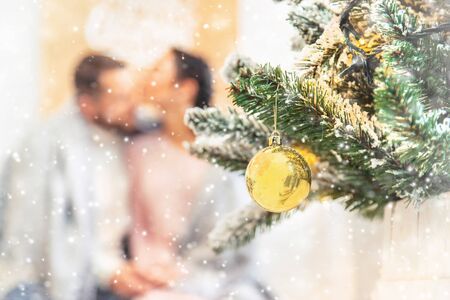 Lovers man and woman on a Christmas background. Selective focus. Holiday.の写真素材