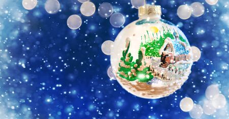 Merry Christmas and Happy New Year, Holidays greeting card with blurred bokeh background.の写真素材