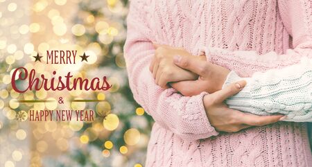 Lovers man and woman on a Christmas background. Holiday. Selective focus.の写真素材