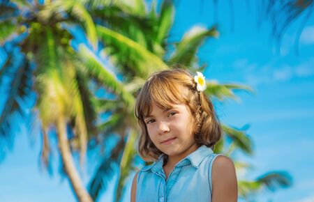 Child girl on the beach in Sri Lanka. Selective focus.の写真素材