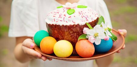 A child with Easter treats. Selective focus. nature.