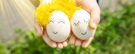 homemade eggs with beautiful faces and a smile. Selective focus. nature.