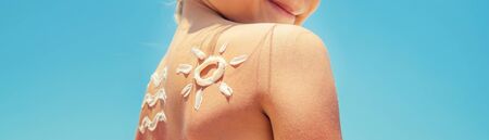 Sunscreen on the skin of a child. Selective focus.