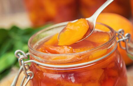 Preservation of peach jam. Selective focus. nature