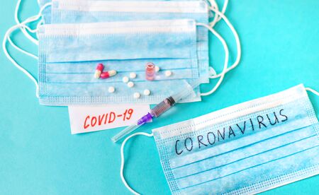 Coronavirus. Remedies. Masks on a blue background. Selective focus medicineの写真素材