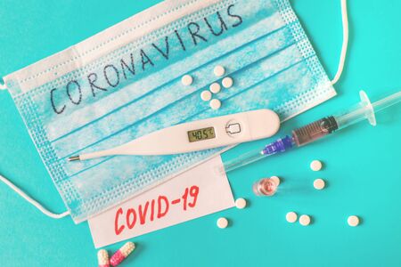 Coronavirus. Remedies. Masks on a blue background. Selective focus medicineの写真素材