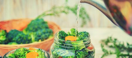 Preservation of broccoli with carrots in jars. Selective focus. nature.の写真素材