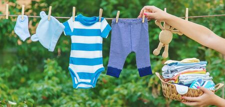 washing baby clothes. Linen dries in the fresh air. Selective focus. nature.
