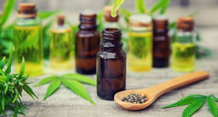 Cannabis oil in a small bottle. Selective focus. nature.の写真素材