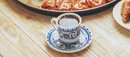 Turkish coffee and baklava on the table. Selective focus. nature.の写真素材