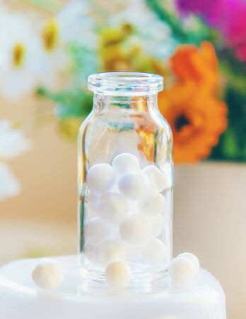 Homeopathy. Herbal extracts in small bottles. Selective focus. nature.の写真素材