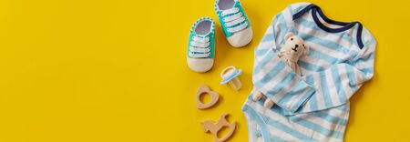 baby accessories for newborns on a colored background. selective focus. nature.の写真素材