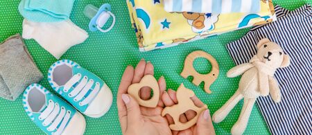 baby accessories for newborns on a colored background. selective focus. nature.の写真素材