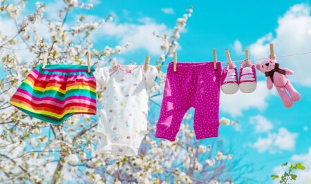 Baby clothes are drying on the street. Selective focus. nature.の写真素材