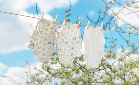 Baby clothes are drying on the street. Selective focus. nature.の写真素材