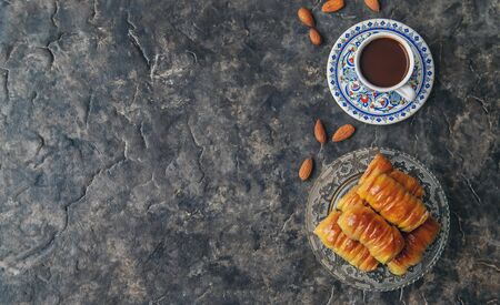 A cup of Turkish coffee and baklava. Selective focus. drink.の写真素材