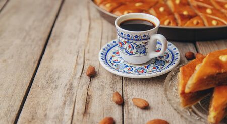 A cup of Turkish coffee and baklava. Selective focus. Drink.の写真素材
